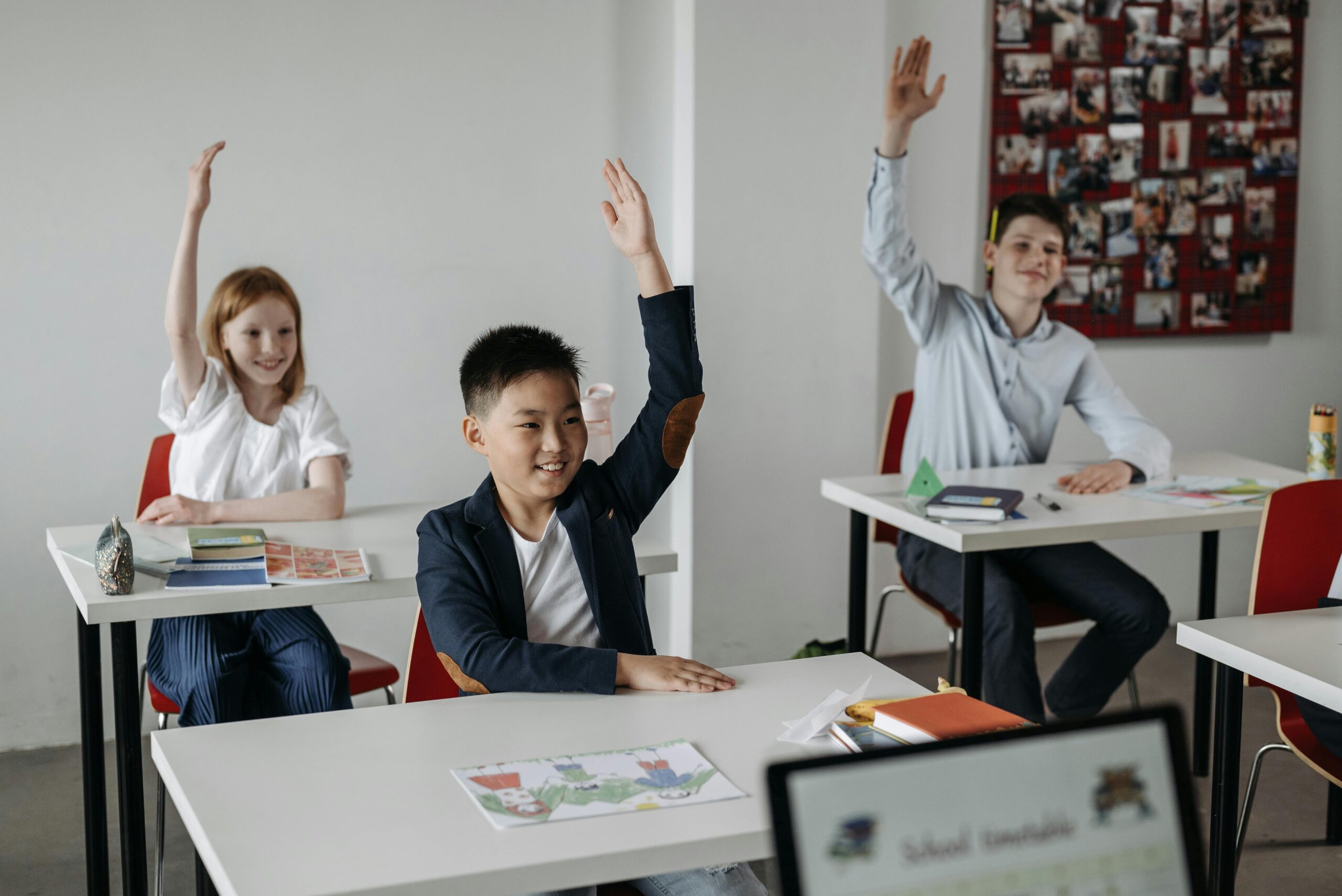 Students Raising Their Hands